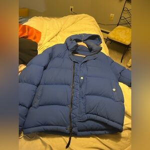 Aritzia super puff marks throughout the coat